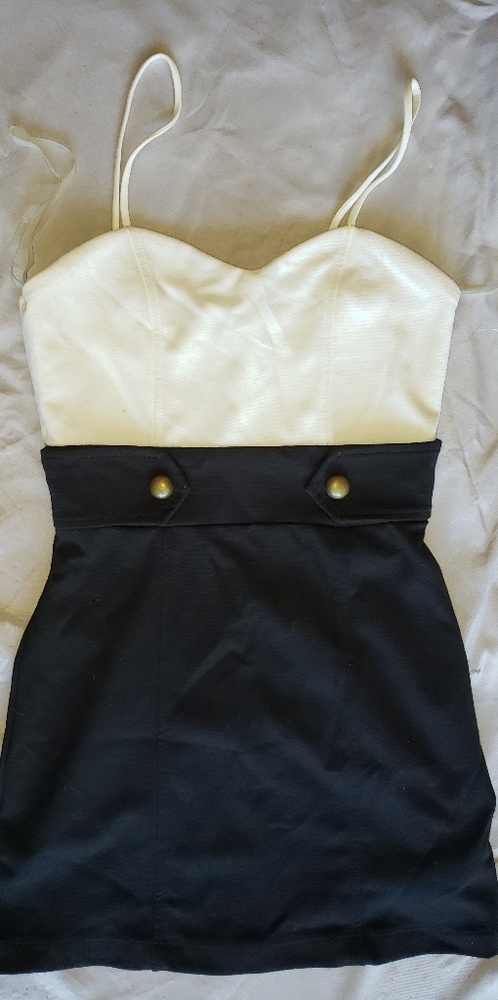 FItted black and cream colored dress size small
